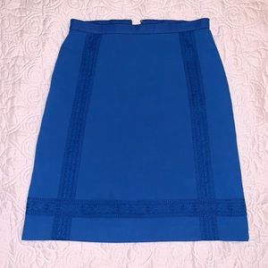 Ann Taylor blue skirt with crochet trim design.